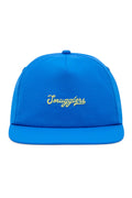 Blue cap with 'Smugglers' logo on a white background