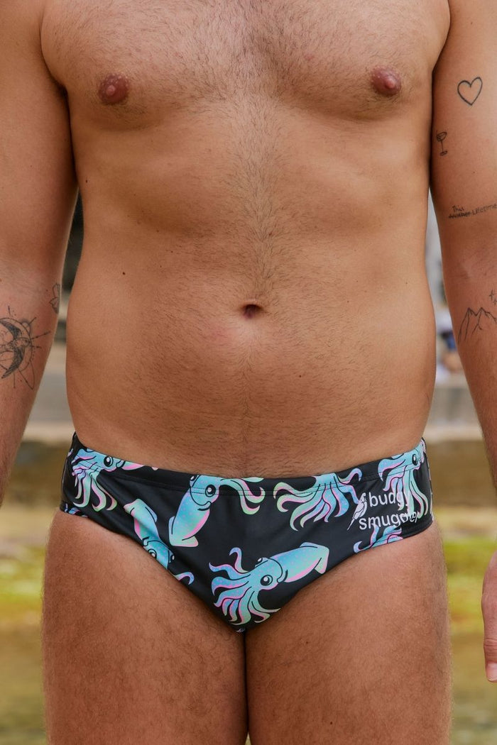 Salt and Pepper pastel squid print swim brief, worn from behind, Budgy Smuggler
