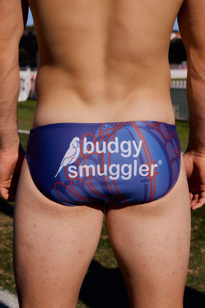 Waratahs 2026 navy swim brief with orange waratah flower outline, Budgy Smuggler